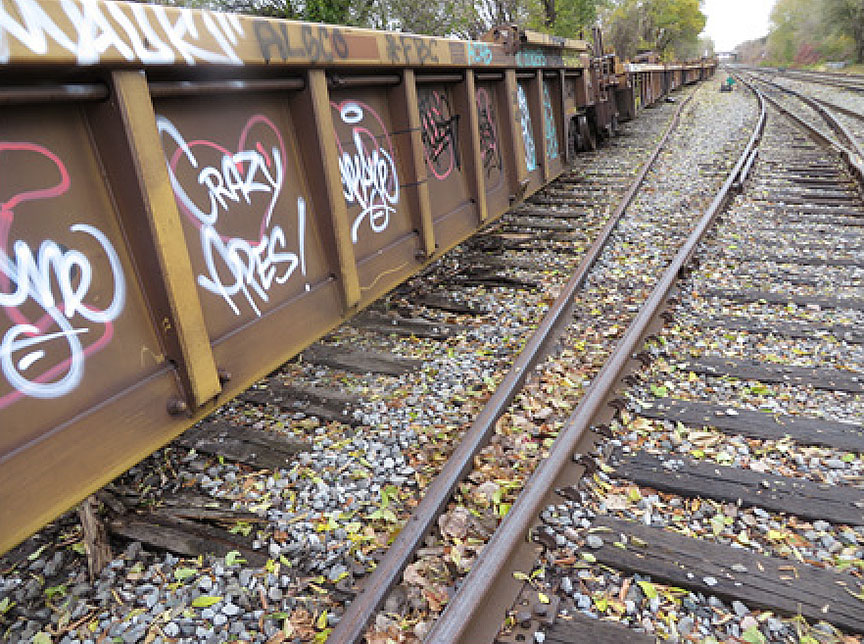 Graffiti on derailed cars