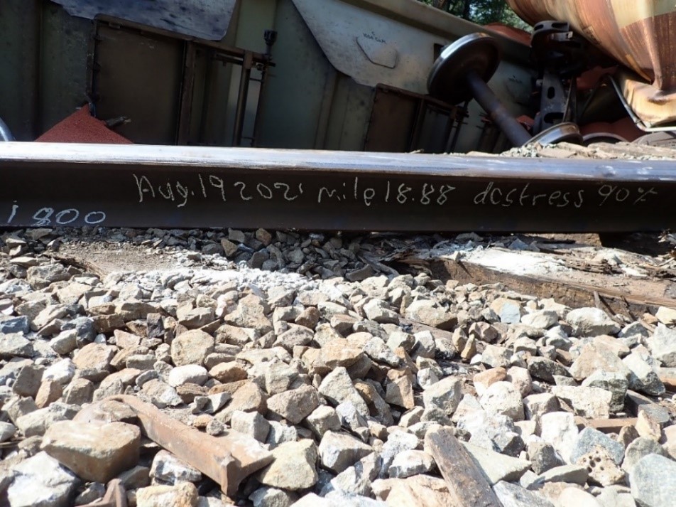 Chalk mark on the south rail indicating that work had recently been performed on the track (Source: TSB)