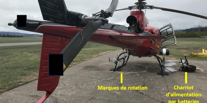 Figure 1. L’hélicoptère à l’étude peu de temps après la perte de maîtrise (Source: Gendarmerie royale du Canada [GRC] de Smithers, avec annotations du BST)